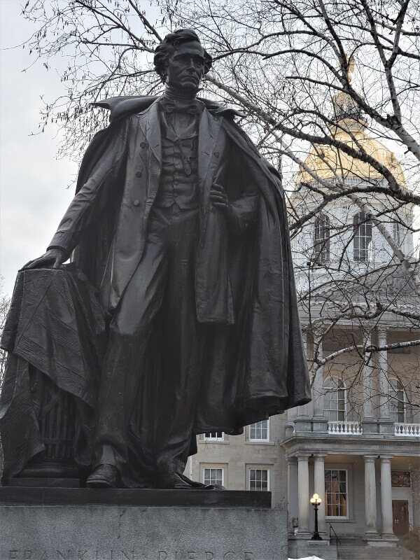 New Hampshire State Capitol building - site of NH pollinator protection legislation and pesticide regulation